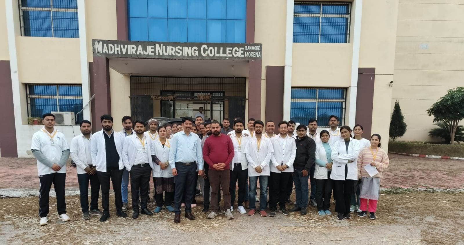 Students and faculty at M.R. Nursing College